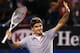 MELBOURNE, AUSTRALIA - JANUARY 19: Roger Federer of Switzerland celebrates winning his third round match against Bernard Tomic of Australia during day six of the 2013 Australian Open at Melbourne Park on January 19, 2013 in Melbourne, Australia. (Photo by Cameron Spencer/Getty Images)