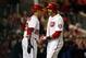WASHINGTON, DC - OCTOBER 12: (R) Michael Morse #38 of the Washington Nationals reacts with teammate Ian Desmond #20 after Morse hits a two-run home run in the third inning against the St. Louis Cardinals in Game Five of the National League Division Series at Nationals Park on October 12, 2012 in Washington, DC. (Photo by Rob Carr/Getty Images)