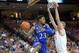 Jan 19, 2013; Austin, TX, USA; Kansas Jayhawks guard Ben McLemore (23) passes the ball around Texas Longhorns forward Connor Lammert (right) during the first half at the Frank Erwin Special Events Center. Mandatory Credit: Brendan Maloney-USA TODAY Sports