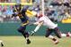 SAN FRANCISCO, CA - NOVEMBER 05: Keenan Allen #21 of the California Golden Bears runs around Alex Hoffman-Ellis #17 of the Washington State Cougars at AT&T Park on November 5, 2011 in San Francisco, California. (Photo by Ezra Shaw/Getty Images)
