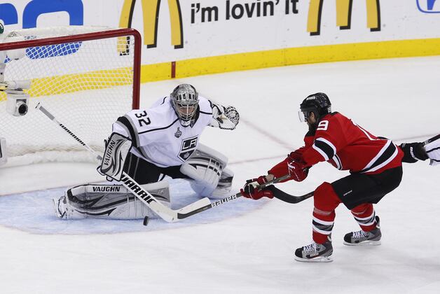 Devils beat Islanders in opener