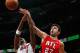 ATLANTA, GA - NOVEMBER 09: Zaza Pachulia #27 of the Atlanta Hawks battles for a rebound against Chris Bosh #1 of the Miami Heat at Philips Arena on November 9, 2012 in Atlanta, Georgia. NOTE TO USER: User expressly acknowledges and agrees that, by downloading and or using this photograph, User is consenting to the terms and conditions of the Getty Images License Agreement. (Photo by Kevin C. Cox/Getty Images)