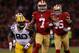 SAN FRANCISCO, CA - JANUARY 12: Quarterback Colin Kaepernick #7 of the San Francisco 49ers runs the ball against nose tackle B.J. Raji #90 of the Green Bay Packers during the NFC Divisional Playoff Game at Candlestick Park on January 12, 2013 in San Francisco, California. (Photo by Stephen Dunn/Getty Images)