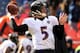 DENVER, CO - JANUARY 12: Joe Flacco #5 of the Baltimore Ravens warms up against the Denver Broncos during the AFC Divisional Playoff Game at Sports Authority Field at Mile High on January 12, 2013 in Denver, Colorado. (Photo by Doug Pensinger/Getty Images)