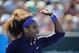 MELBOURNE, AUSTRALIA - JANUARY 20: Serena Williams of the United States of America waves to the crowd in her third round doubles match with Venus Williams of the United States of America against Nadia Petrova of Russia and Katarina Srebotnik Slovenia during day seven of the 2013 Australian Open at Melbourne Park on January 20, 2013 in Melbourne, Australia. (Photo by Vince Caligiuri/Getty Images)