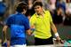 INDIAN WELLS, CA - MARCH 13: Roger Federer of Switzerland is congratulated by Milos Raonic of Canada after their match during the BNP Paribas Open at the Indian Wells Tennis Garden on March 13, 2012 in Indian Wells, California. (Photo by Matthew Stockman/Getty Images)