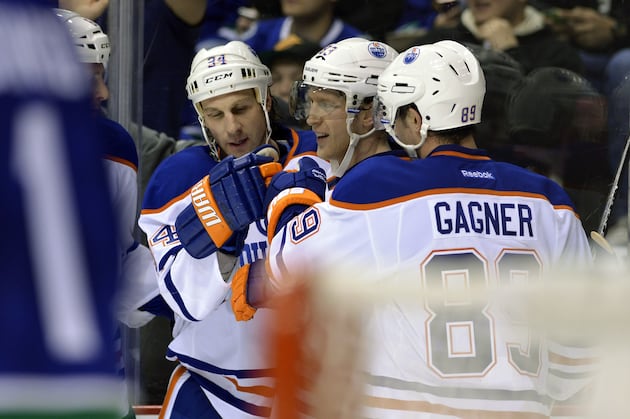 Oilers Rally from 2-0 Deficit to Win Opening Game of Lockout-Shortened Season