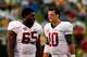 COLUMBIA, MO - OCTOBER 13: Quarterback AJ McCarron #10 of the Alabama Crimson Tide jokes with offensive linesman Chance Warmack #65 prior to the game against the Missouri Tigers at Faurot Field/Memorial Stadium on October 13, 2012 in Columbia, Missouri. (Photo by Jamie Squire/Getty Images)