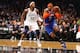 NEW YORK, NY - DECEMBER 11: Carmelo Anthony #7 of the New York Knicks drives against Gerald Wallace #45 of the Brooklyn Nets during their game at the Barclays Center on December 11, 2012 in the Brooklyn borough of New York City. NOTE TO USER: User expressly acknowledges and agrees that, by downloading and/or using this photograph, user is consenting to the terms and conditions of the Getty Images License Agreement. (Photo by Al Bello/Getty Images)