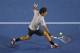 MELBOURNE, AUSTRALIA - JANUARY 21: Roger Federer of Switzerland plays a backhand volley in his fourth round match against Milos Raonic of Canada during day eight of the 2013 Australian Open at Melbourne Park on January 21, 2013 in Melbourne, Australia. (Photo by Quinn Rooney/Getty Images)