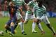 GLASGOW, SCOTLAND - NOVEMBER 07: Charlie Mulgrew and Victor Wanyama of Celtic challenge Andres Iniesta of Barcelona during the UEFA Champions League Group G match between Celtic and Barcelona at Celtic Park on November 7, 2012 in Glasgow, Scotland. (Photo by Jeff J Mitchell/Getty Images)