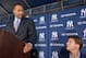 TAMPA, FL - DECEMBER 07: Shortstop Derek Jeter of the New York Yankees (L) looks at Managing General Partner Hal Steinbrenner as he talks to the media during a press conference to announce his new contract with the club on December 7, 2010 in Tampa, Florida. (Photo by Tim Boyles/Getty Images)