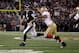 BALTIMORE, MD - NOVEMBER 24: Joe Flacco #5 of the Baltimore Ravens gets off a pass while being pressured by Ahmad Brooks #55 of the San Francisco 49ers at M&T Bank Stadium on November 24, 2011 in Baltimore, Maryland. (Photo by Rob Carr/Getty Images)