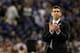 HOUSTON, TX - APRIL 04: Head coach Brad Stevens of the Butler Bulldogs claps from the sidelines against the Connecticut Huskies during the National Championship Game of the 2011 NCAA Division I Men's Basketball Tournament at Reliant Stadium on April 4, 2011 in Houston, Texas. (Photo by Streeter Lecka/Getty Images)