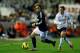 VALENCIA, SPAIN - JANUARY 20: Luka Modric of Real Madrid CF competes for the ball with Pablo Hernandez of Valencia CF during the La Liga match between Valencia CF and Real Madrid CF at Estadio Mestalla on January 20, 2013 in Valencia, Spain. (Photo by Gonzalo Arroyo Moreno/Getty Images)