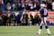 FOXBORO, MA - JANUARY 20: Tom Brady #12 of the New England Patriots walks off the field after a play against the Baltimore Ravens during the 2013 AFC Championship game at Gillette Stadium on January 20, 2013 in Foxboro, Massachusetts. (Photo by Jim Rogash/Getty Images)