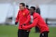 MANCHESTER, ENGLAND - FEBRUARY 22: Javier Hernandez and Danny Welbeck share a joke during the Manchester United training ahead of their UEFA Europa League round of 32 second leg match against Ajax session at the Carrington Training Ground on February 22, 2012 in Manchester, England. (Photo by Michael Regan/Getty Images)