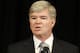 INDIANAPOLIS, IN - JULY 23: NCAA president Mark Emmert speaks during a press conference at the NCAA's headquarters to announce sanctions against Penn State University's football program on July 23, 2012 in Indianapolis, Indiana. The sanctions are a result of a report that the university concealed allegations of child sexual abuse made against former defensive coordinator Jerry Sandusky, who was found guilty on 45 of 48 counts related to sexual abuse of boys over a 15-year period. (Photo by Joe Robbins/Getty Images)