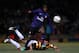 BRADFORD, ENGLAND - DECEMBER 11: Gervinho of Arsenal and Carl McHugh of Bradford compete for the ball during the Capital One Cup quarter final match between Bradford City and Arsenal at the Coral Windows Stadium, Valley Parade on December 11, 2012 in Bradford, England. (Photo by Clive Brunskill/Getty Images)