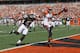 CINCINNATI, OH - SEPTEMBER 16: A.J. Green #18 of the Cincinnati Bengals scores a touchdown in front of T.J. Ward #43 of the Cleveland Browns during their game at Paul Brown Stadium on September 16, 2012 in Cincinnati, Ohio. The Bengals defeated the Browns 34-27. (Photo by John Grieshop/Getty Images)
