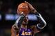 DENVER, CO - DECEMBER 26: Dwight Howard #12 of the Los Angeles Lakers takes a free throw against the Denver Nuggets at Pepsi Center on December 26, 2012 in Denver, Colorado. The Nuggets defeated the Lakers 126-114. NOTE TO USER: User expressly acknowledges and agrees that, by downloading and or using this photograph, User is consenting to the terms and conditions of the Getty Images License Agreement. (Photo by Doug Pensinger/Getty Images)