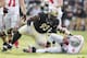 WEST LAFAYETTE, IN - NOVEMBER 12: Kawann Short #93 of the Purdue Boilermakers celebrates after sacking Braxton Miller #5 of the Ohio State Buckeyes at Ross-Ade Stadium on November 12, 2011 in West Lafayette, Indiana. Purdue defeated Ohio State 26-23 in overtime. (Photo by Joe Robbins/Getty Images)