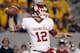 MORGANTOWN, WV - NOVEMBER 17: Landry Jones #12 of the Oklahoma Sooners drops back to pass against the West Virginia Mountaineers during the game on November 17, 2012 at Mountaineer Field in Morgantown, West Virginia. (Photo by Justin K. Aller/Getty Images)