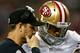ATLANTA, GA - JANUARY 20: Head coach Jim Harbaugh talks with quarterback Colin Kaepernick #7 of the San Francisco 49ers in the third quarter while taking on the Atlanta Falcons in the NFC Championship game at the Georgia Dome on January 20, 2013 in Atlanta, Georgia. (Photo by Chris Graythen/Getty Images)