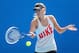 MELBOURNE, AUSTRALIA - JANUARY 23: Maria Sharapova of Russia plays a forehand in a practice session during day ten of the 2013 Australian Open at Melbourne Park on January 23, 2013 in Melbourne, Australia. (Photo by Julian Finney/Getty Images)