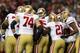 ATLANTA, GA - JANUARY 20: Quarterback Colin Kaepernick (C) #7 of the San Francisco 49ers calls a play in the huddle against the Atlanta Falcons in the NFC Championship game at the Georgia Dome on January 20, 2013 in Atlanta, Georgia. (Photo by Streeter Lecka/Getty Images)