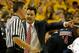 January 19, 2013; Tempe, AZ, USA; Arizona Wildcats head coach Sean Miller talks to a referee during the first half against the Arizona State Sun Devils at Wells Fargo Arena. Mandatory Credit: Rick Scuteri-USA TODAY Sports
