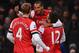 LONDON, ENGLAND - JANUARY 23: Olivier Giroud of Arsenal celebrates scoring their second goal with Theo Walcott of Arsenal and Per Mertesacker of Arsenal during the Barclays Premier League match between Arsenal and West Ham United at Emirates Stadium on January 23, 2013 in London, England. (Photo by Mike Hewitt/Getty Images)