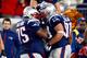 FOXBORO, MA - JANUARY 13: Rob Ninkovich #50 of the New England Patriots celebrates with his team after making an interception in the third quarter against the Houston Texans during the 2013 AFC Divisional Playoffs game at Gillette Stadium on January 13, 2013 in Foxboro, Massachusetts. (Photo by Jared Wickerham/Getty Images)