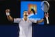 MELBOURNE, AUSTRALIA - JANUARY 22: Novak Djokovic of Serbia celebrates after winning his Quarterfinal match against Tomas Berdych of the Czech Republic during day nine of the 2013 Australian Open at Melbourne Park on January 22, 2013 in Melbourne, Australia. (Photo by Scott Barbour-Pool/Getty Images)