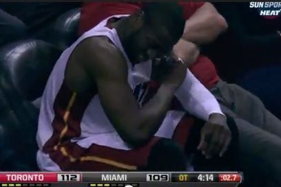 Video: Dwyane Wade Takes a Courtside Seat During Overtime