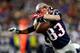 FOXBORO, MA - JANUARY 20: Wes Welker #83 of the New England Patriots misses a ball thrown by Tom Brady #12 against the Baltimore Ravens in the first quarter during the 2013 AFC Championship game at Gillette Stadium on January 20, 2013 in Foxboro, Massachusetts. (Photo by Jared Wickerham/Getty Images)