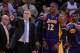 December 22, 2012; Oakland, CA, USA; Los Angeles Lakers head coach Mike D'Antoni (left) and center Dwight Howard (12) react after Howard fouled out during the overtime quarter against the Golden State Warriors at ORACLE Arena. The Lakers defeated the Warriors 118-115 in overtime. Mandatory Credit: Kyle Terada-USA TODAY Sports