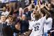 Jan 22, 2013; Philadelphia, PA, USA; Villanova Wildcats forward JayVaughn Pinkston (22) and forward Maurice Sutton (25) celebrate late in the second half against the Louisville Cardinals at the Wells Fargo Center. Villanova defeated Louisville 73-64. Mandatory Credit: Howard Smith-USA TODAY Sports