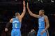 Jan 11, 2013; Los Angeles, CA, USA; Oklahoma City Thunder guard Russell Westbrook (0) and forward Kevin Durant (35) exchange high fives against the Los Angeles Lakers at the Staples Center. Mandatory Credit: Kirby Lee/USA TODAY Sports