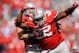 COLUMBUS, OH - SEPTEMBER 15: Johnathan Hankins #52 of the Ohio State Buckeyes celebrates a sack on quarterback Zach Maynard #15 of the California Golden Bears with teammate Garrett Goebel #53 at Ohio Stadium on September 15, 2012 in Columbus, Ohio. Ohio State defeated California 35-28. (Photo by Jamie Sabau/Getty Images)