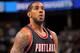 DENVER, CO - JANUARY 15: LaMarcus Aldridge #12 of the Portland Trail Blazers takes a free throw against the Denver Nuggets at the Pepsi Center on January 15, 2013 in Denver, Colorado. The Nuggets defeated the Trail Blazers 115-111 in overtime. NOTE TO USER: User expressly acknowledges and agrees that, by downloading and or using this photograph, User is consenting to the terms and conditions of the Getty Images License Agreement. (Photo by Doug Pensinger/Getty Images)