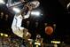 ANN ARBOR, MI - JANUARY 06: Glenn Robinson III #1 of the Michigan Wolverines gets in for a first half dunk next to Gabriel Olaseni #0 of the Iowa Hawkeyes at Crisler Center on January 6, 2013 in Ann Arbor, Michigan. (Photo by Gregory Shamus/Getty Images)