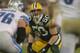 GREEN BAY, WI - DECEMBER 09: A.J. Hawk #50 of the Green Bay Packers awaits the snap against the Detroit Lions at Lambeau Field on December 9, 2012 in Green Bay, Wisconsin. The Packers defeated the Lions 27-20. (Photo by Jonathan Daniel/Getty Images)