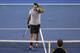 MELBOURNE, AUSTRALIA - JANUARY 25: Andy Murray of Great Britain walks to the court to shake hands with Roger Federer of Switzerland after Murray won their semifinal match during day twelve of the 2013 Australian Open at Melbourne Park on January 25, 2013 in Melbourne, Australia. (Photo by Scott Barbour/Getty Images)