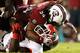 COLUMBIA, SC - OCTOBER 06: Shaq Wilson #54 of the South Carolina Gamecocks tackles Keith Marshall #4 of the Georgia Bulldogs at Williams-Brice Stadium on October 6, 2012 in Columbia, South Carolina. (Photo by Kevin C. Cox/Getty Images)