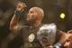 September 22, 2012; Toronto, ON, CANADA; Demetrious Johnson celebrates his win over Joseph Benavidez (not pictured) in the flyweight championship during UFC 152 at the Air Canada Centre. Mandatory Credit: Tom Szczerbowski-USA TODAY Sports