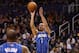 PHOENIX, AZ - DECEMBER 09: J.J. Redick #7 of the Orlando Magic puts up a three point shot against the Phoenix Suns during the NBA game at US Airways Center on December 9, 2012 in Phoenix, Arizona. NOTE TO USER: User expressly acknowledges and agrees that, by downloading and or using this photograph, User is consenting to the terms and conditions of the Getty Images License Agreement. (Photo by Christian Petersen/Getty Images)