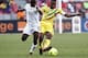 PORT ELIZABETH, SOUTH AFRICA - JANUARY 24: Mubarak Wakaso (L) of Ghana and Seydou Keita of Mali during the 2013 African Cup of Nations match between Mali and Ghana at Nelson Mandela Bay Stadium on January 24, 2013 in Port Elizabeth, South Africa. (Photo by Michael Sheehan/Gallo Images/Getty Images)