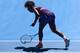 MELBOURNE, VICTORIA - JANUARY 23: Serena Williams of the United States of America smashes her racquet as she walks to her chair between games in her Quarterfinal match against Sloane Stephens of the United States of America during day ten of the 2013 Australian Open at Melbourne Park on January 23, 2013 in Melbourne, Australia. (Photo by Matthew Mallett/Getty Images)