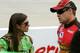DOVER, DE - SEPTEMBER 29: Danica Patrick, driver of the #7 GoDaddy.com Chevrolet, talks to Ricky Stenhouse Jr., driver of the #6 Cargill/Rancher's Reserve Ford, on the grid during qualifying for the NASCAR Nationwide Series OneMain Financial 200 at Dover International Speedway on September 29, 2012 in Dover, Delaware. (Photo by Jerry Markland/Getty Images for NASCAR)